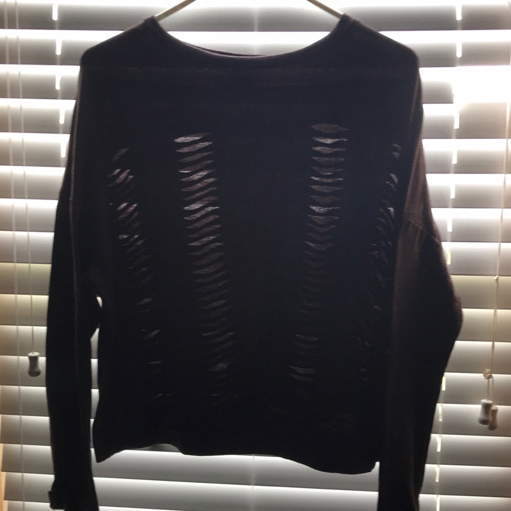 Brown sweater with cuts in the front